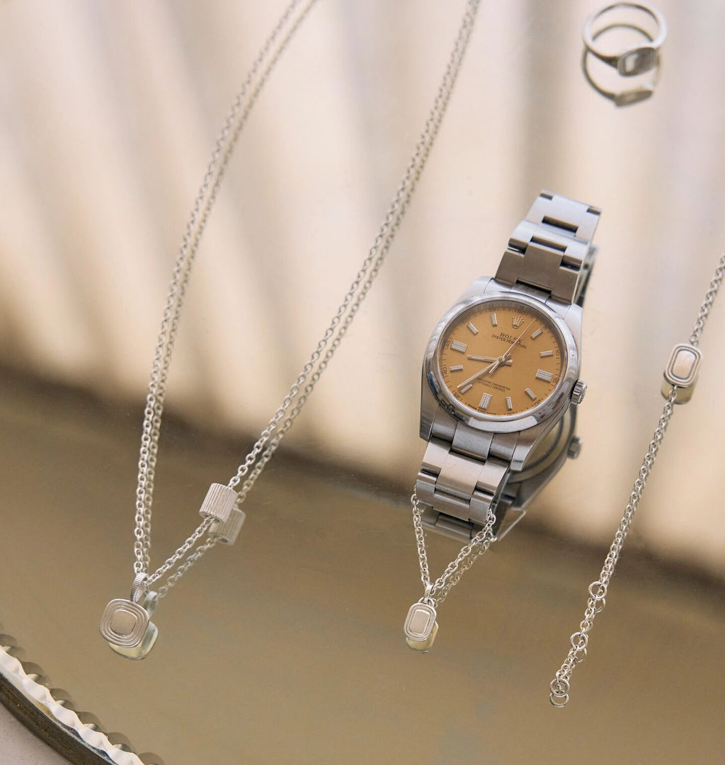 The Estate Watch Charm