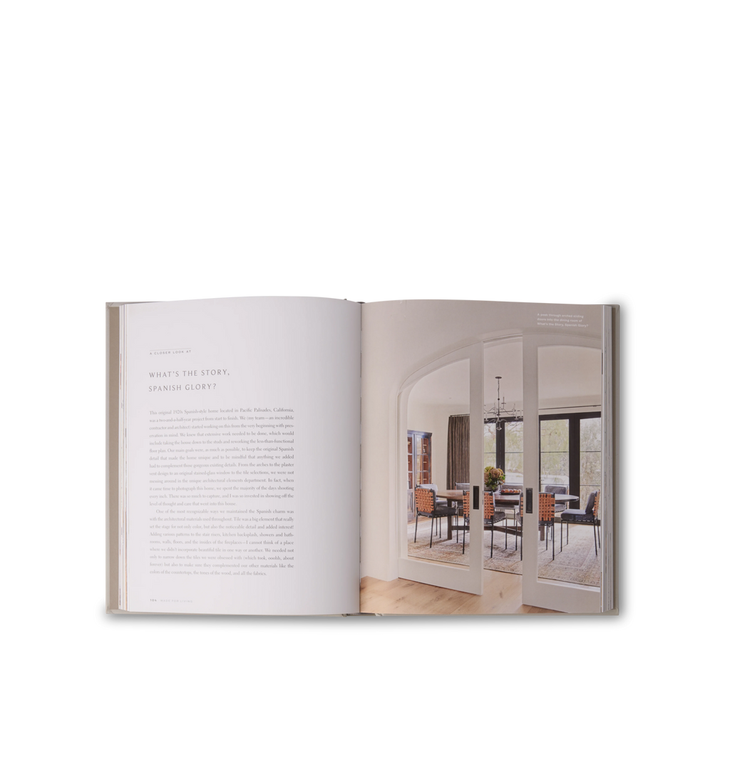 An interior view inside a book featuring home design photos and text set on a white background
