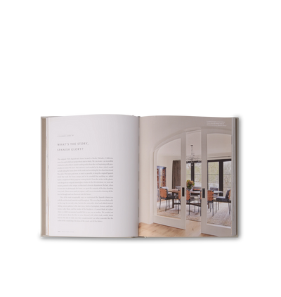 An interior view inside a book featuring home design photos and text set on a white background