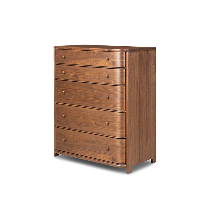 An angled view of a five-drawer wooden chest of drawers with a curved front and small round knobs, shown against a plain light gray background.