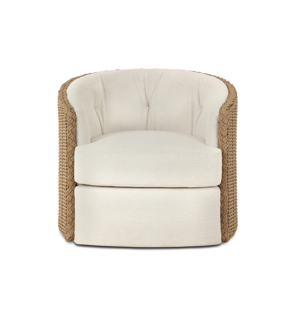 A curved outdoor swivel chair with a woven braided wicker back and sides and plush off white tufted seating