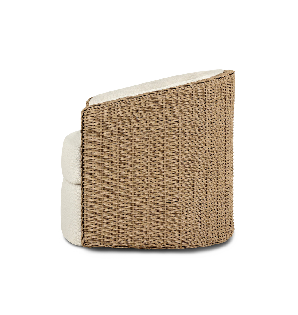 A curved outdoor swivel chair with a woven braided wicker back and sides and plush off white tufted seating
