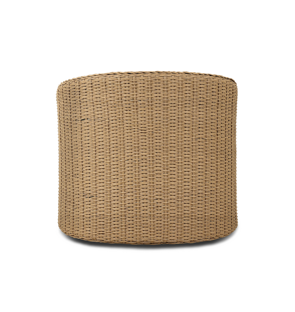 A curved outdoor swivel chair with a woven braided wicker back and sides and plush off white tufted seating