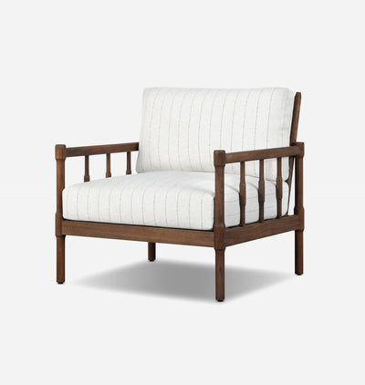 A modern outdoor accent chair with a dark brown wooden frame and white striped cushions, shown against a light gray background.