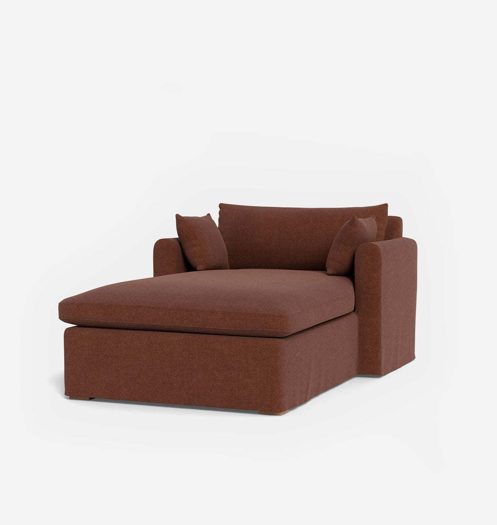 A modern brown upholstered chaise lounge chair with two matching back cushions, shown on a clean white background.