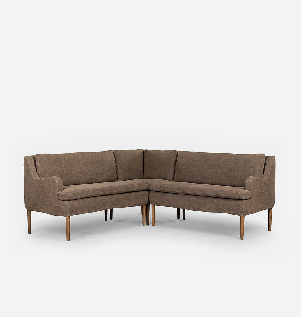 A mid-century modern L-shaped sectional sofa upholstered in textured brown fabric with tapered wooden legs, shown against a plain light gray background.