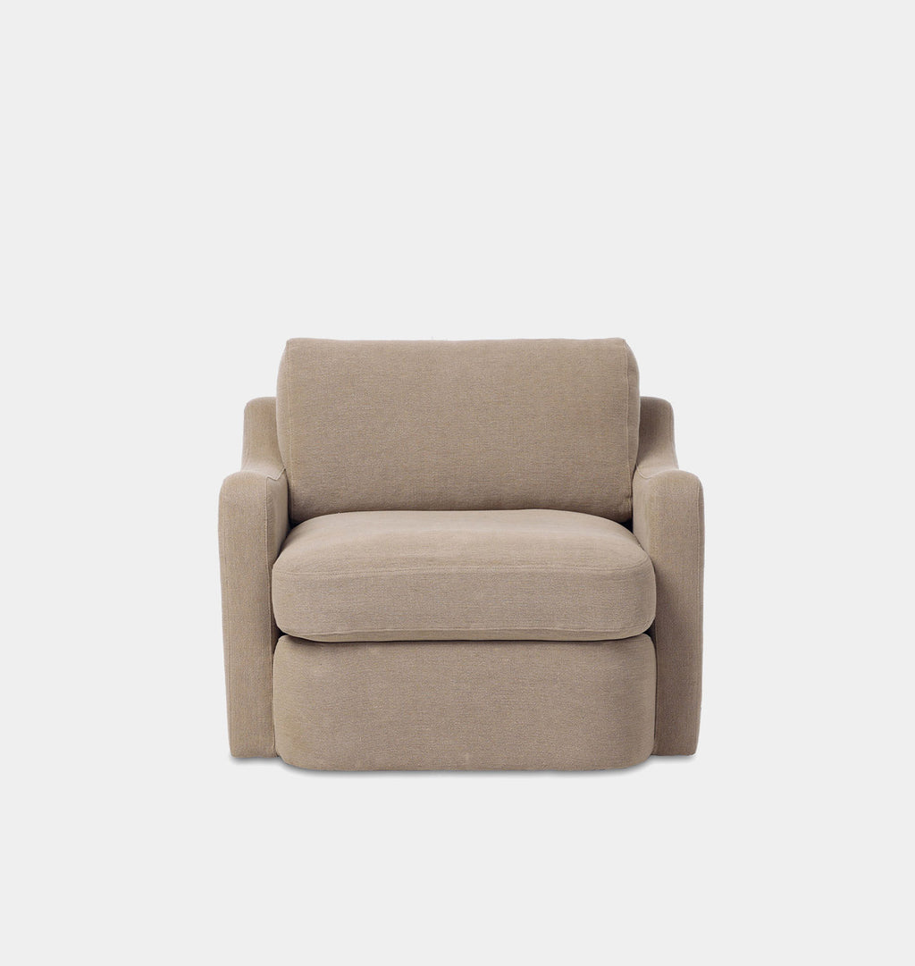 A modern low-profile armchair upholstered in a textured taupe-beige fabric, shown from the front against a solid light gray background.