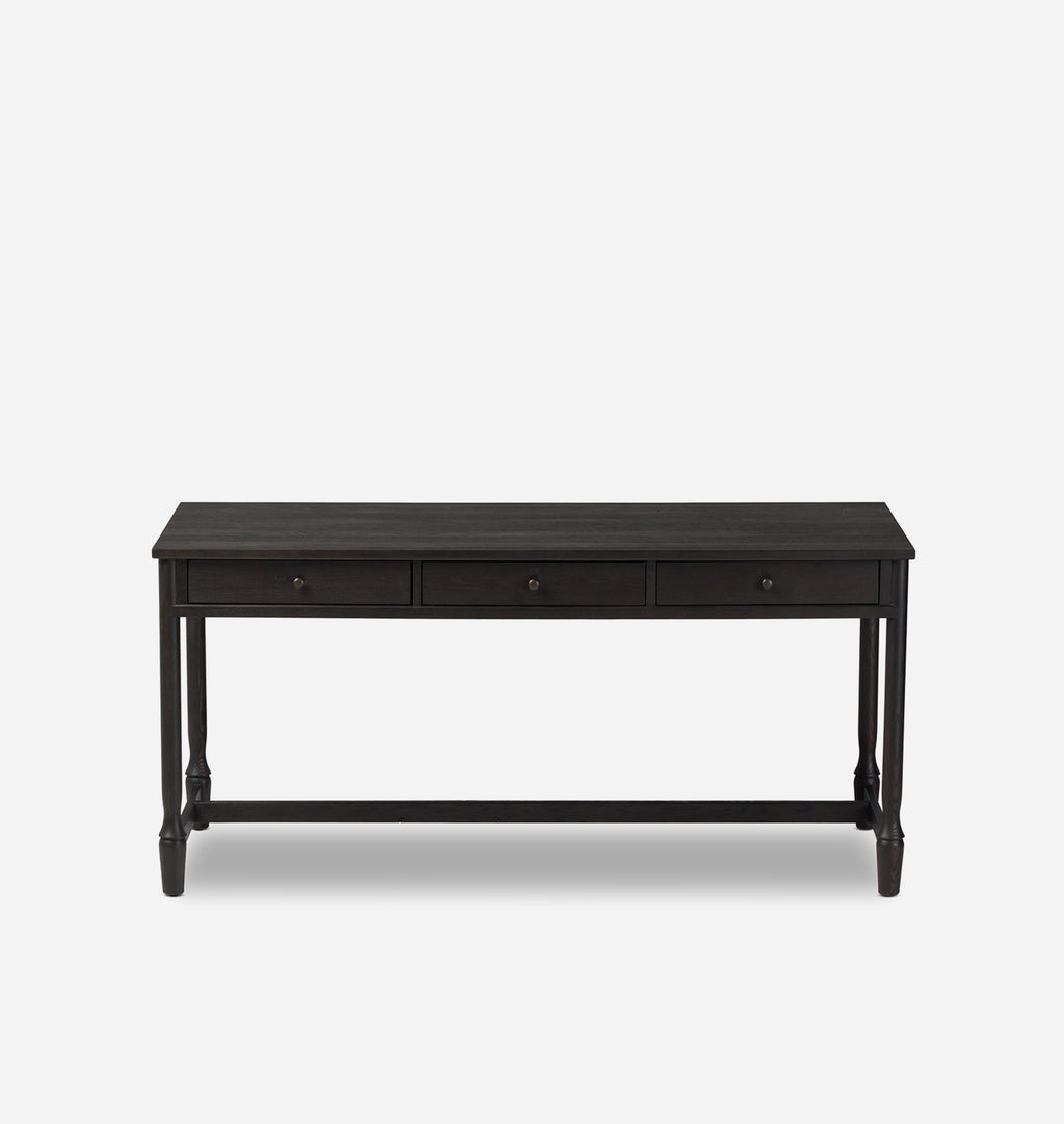 A dark brown wooden console table with three drawers and small round knobs, shown against a light gray background.