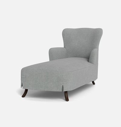 A light gray upholstered wingback chaise lounge chair with dark wooden legs, shown from a three-quarter angle on a clean white background.