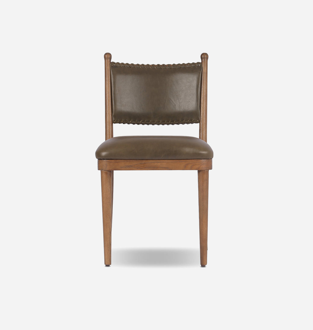 A wooden dining chair with a brown leather upholstered seat and backrest, featuring a nailhead trim on the backrest and tapered wooden legs, shown against a light gray background.