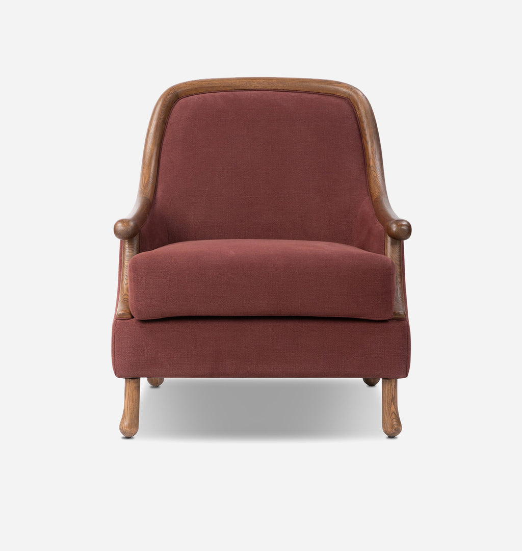 A classic French-style armchair with a warm rust-red upholstered fabric and a natural wood frame, shown from a front-facing perspective on a light gray background.