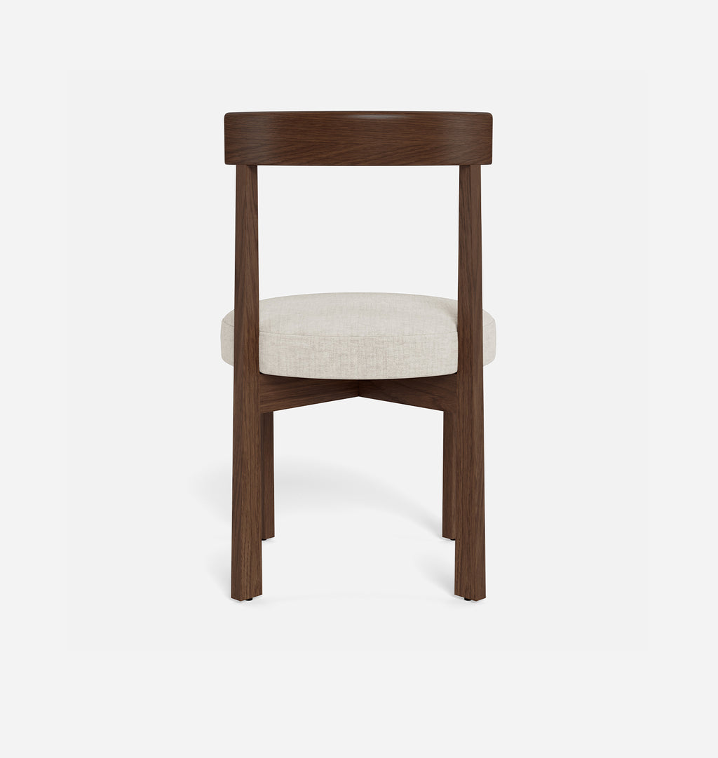 A modern dining chair with a dark brown wood frame and a light beige textured fabric seat cushion, shown from the front against a plain white background.