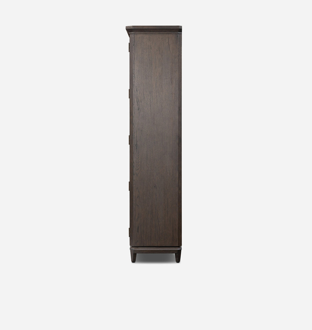 A tall, narrow dark brown wooden cabinet or armoire shown from the front on a plain light gray background.