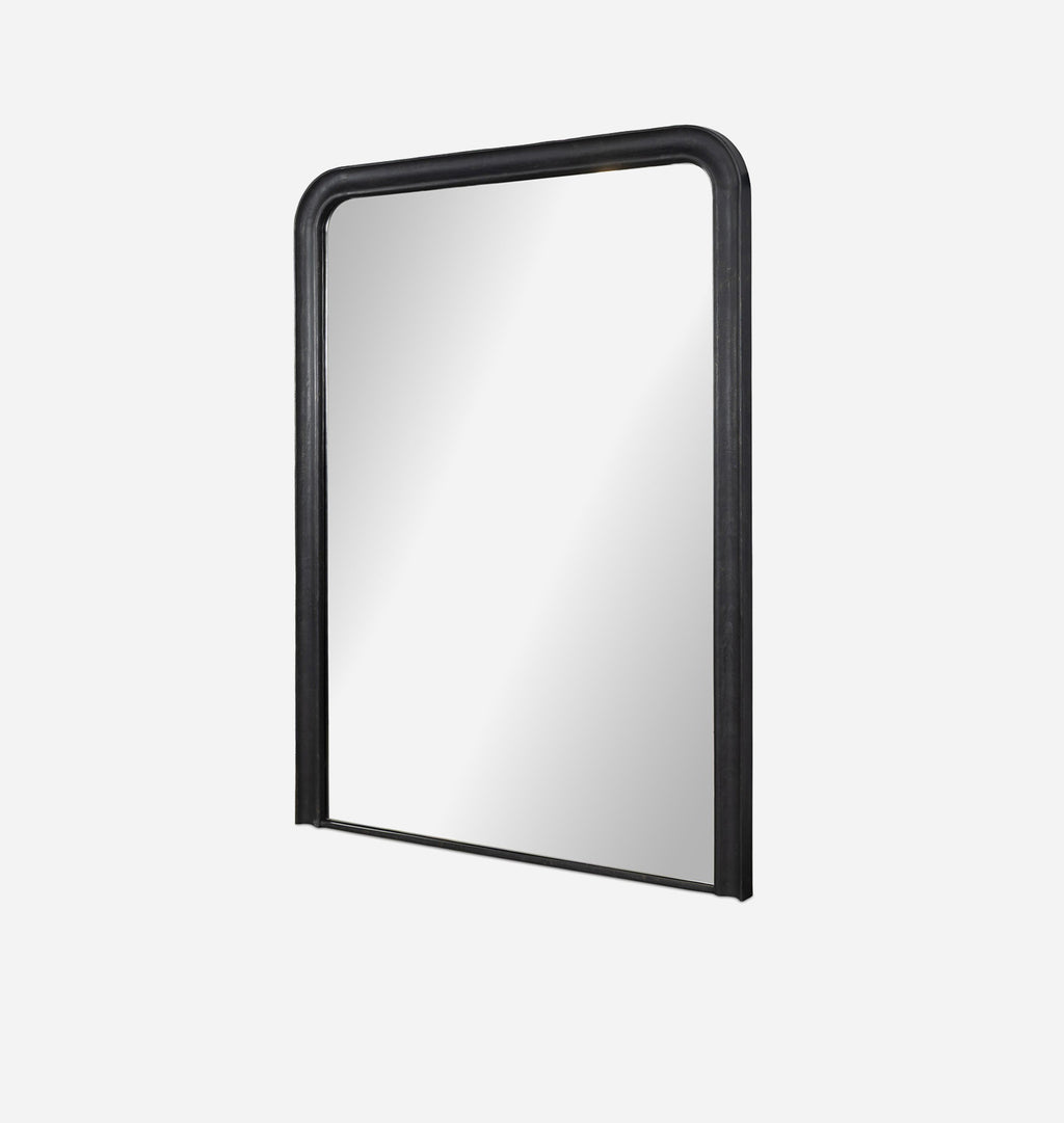 An oversized black aluminium floor mirror with curved corners and a thick frame set against a white background