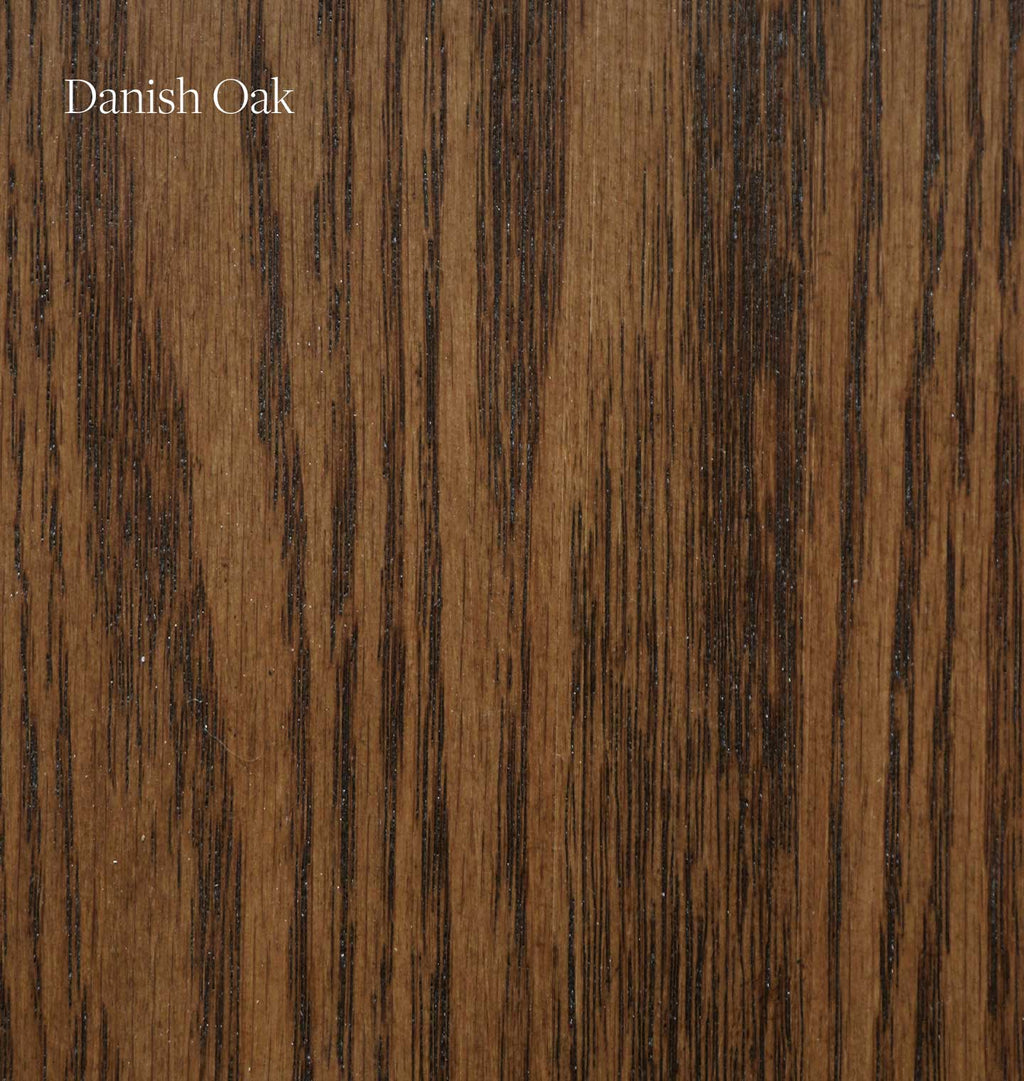 A close-up wood grain sample labeled 'Danish Oak' in white text at the top left, showing a medium-to-dark warm brown wood pattern with dark streaks.