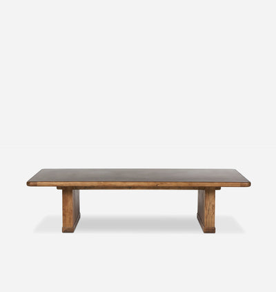 A rustic wooden low table with a dark brown top and weathered brown legs, shown against a plain light gray background.