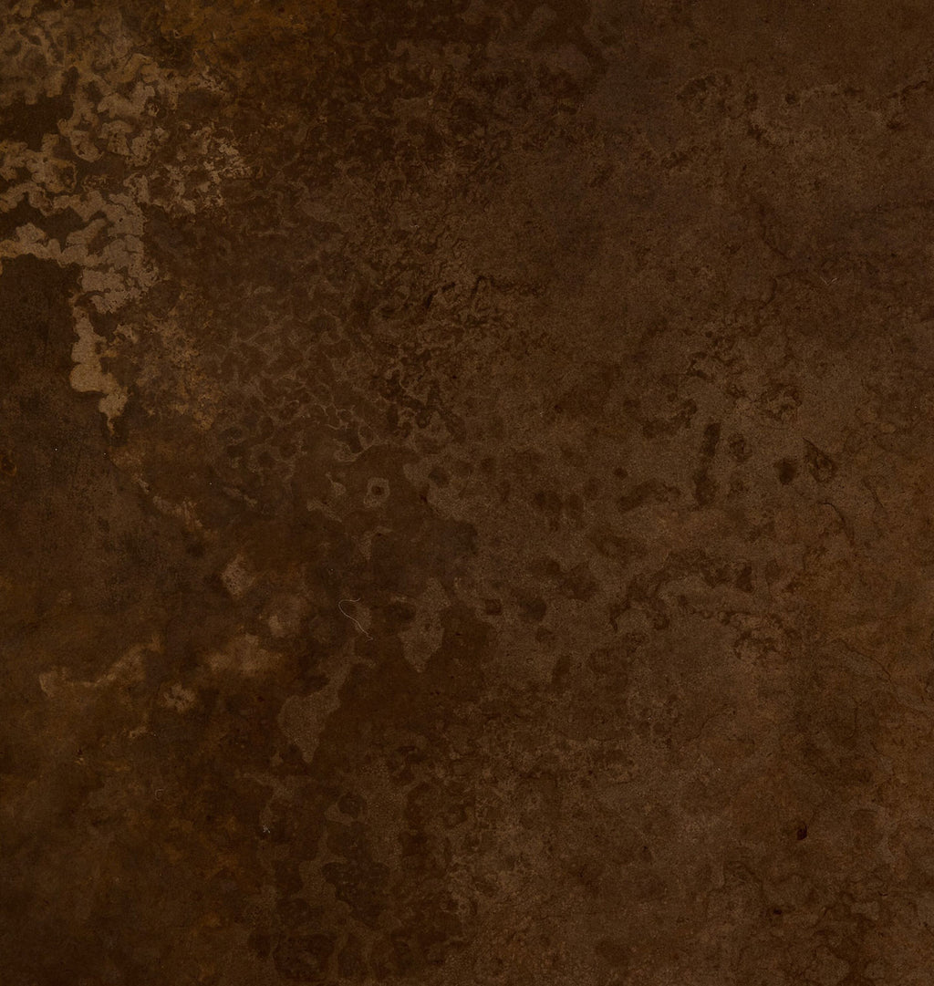 A square sample of distressed dark brown textured material with mottled bronze and tan undertones, resembling aged metal or stained concrete.