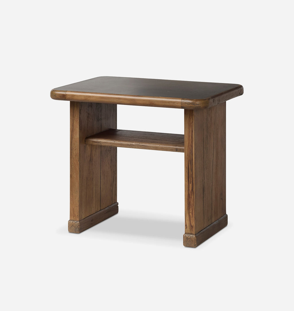 A rustic wooden side table with a medium brown finish, featuring a rectangular top, a lower shelf, and blocky legs, shown on a light gray background.