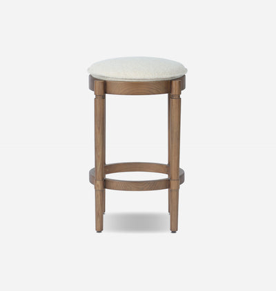 A wooden bar stool with a round off-white textured seat cushion and a medium brown wood frame, shown against a plain light gray background.