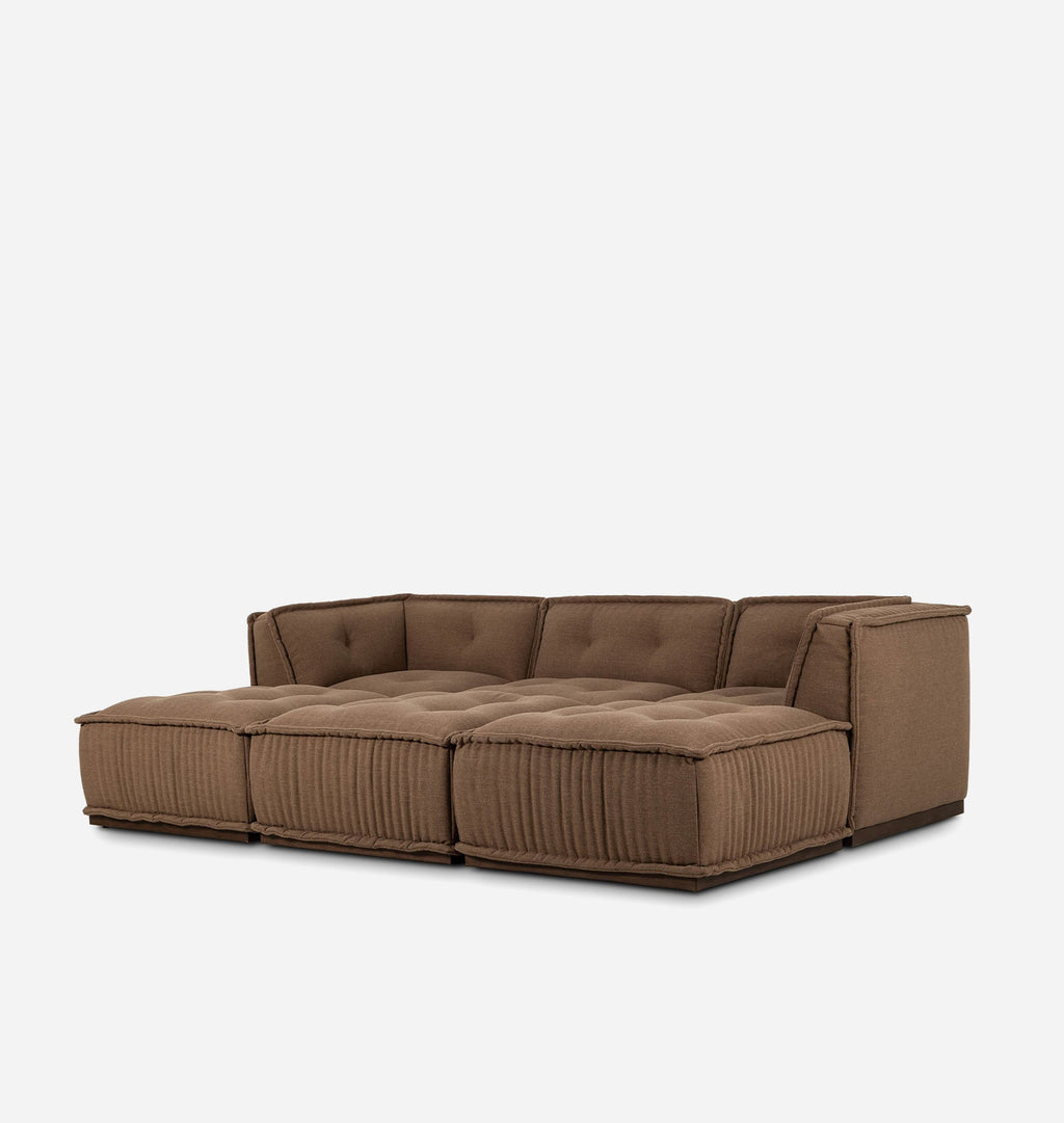 A modern modular sectional sofa upholstered in a textured brown fabric, featuring tufted back cushions and ribbed front panels, shown against a plain light gray background.