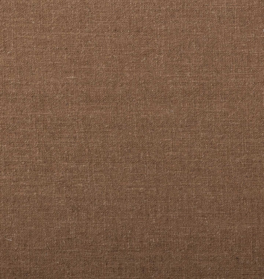 A close-up of a brown woven fabric texture with a fine linen-like weave pattern.