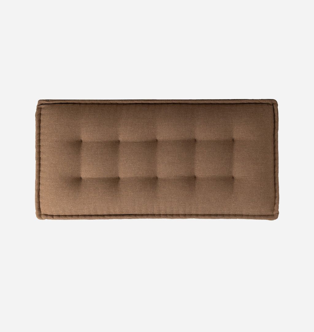 A rectangular brown tufted cushion or bench top with a button-tufted center, shown from a top-down view on a light gray background.