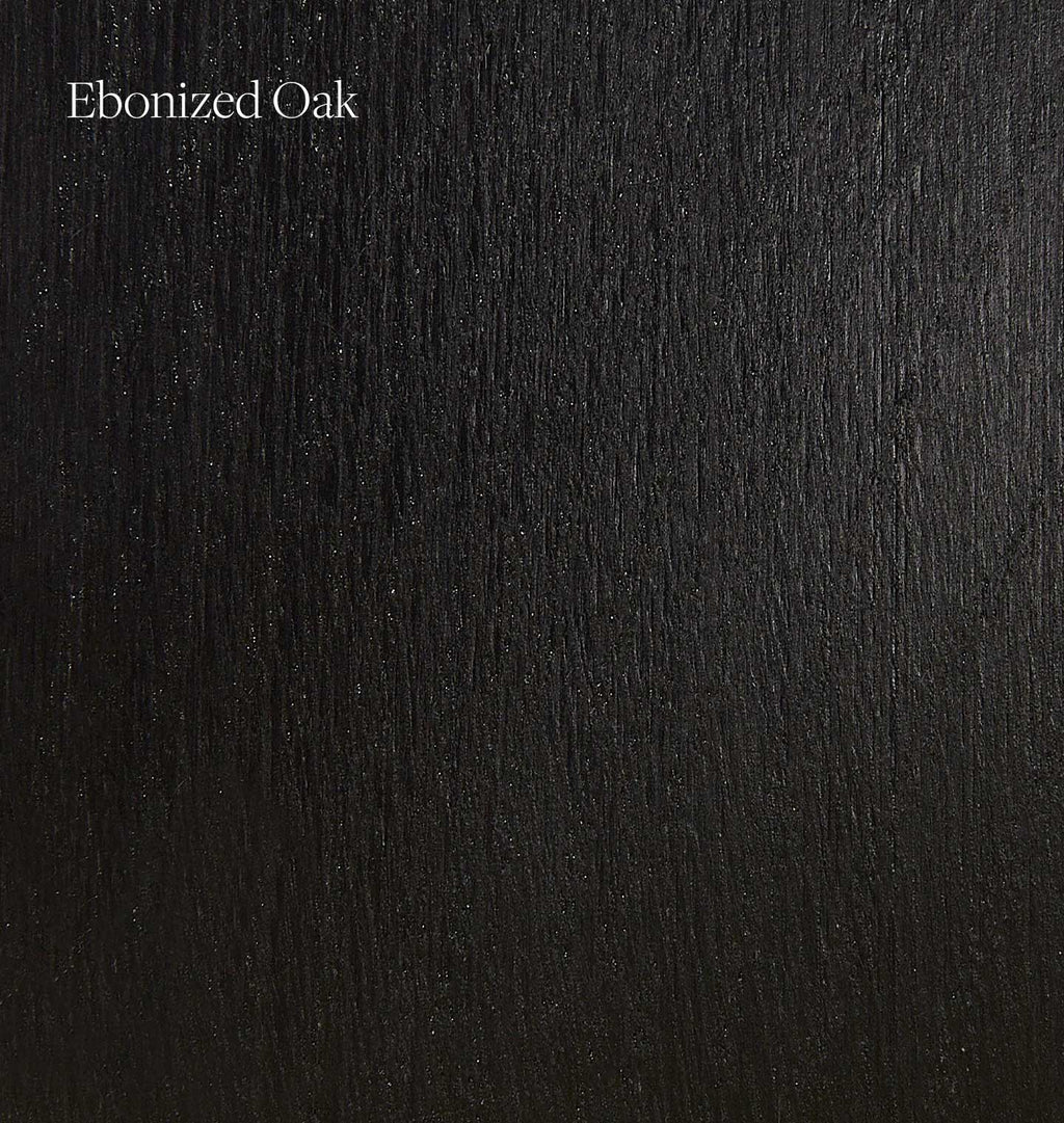 A close-up texture swatch of dark ebonized oak wood grain with the text 'Ebonized Oak' in the upper left corner.