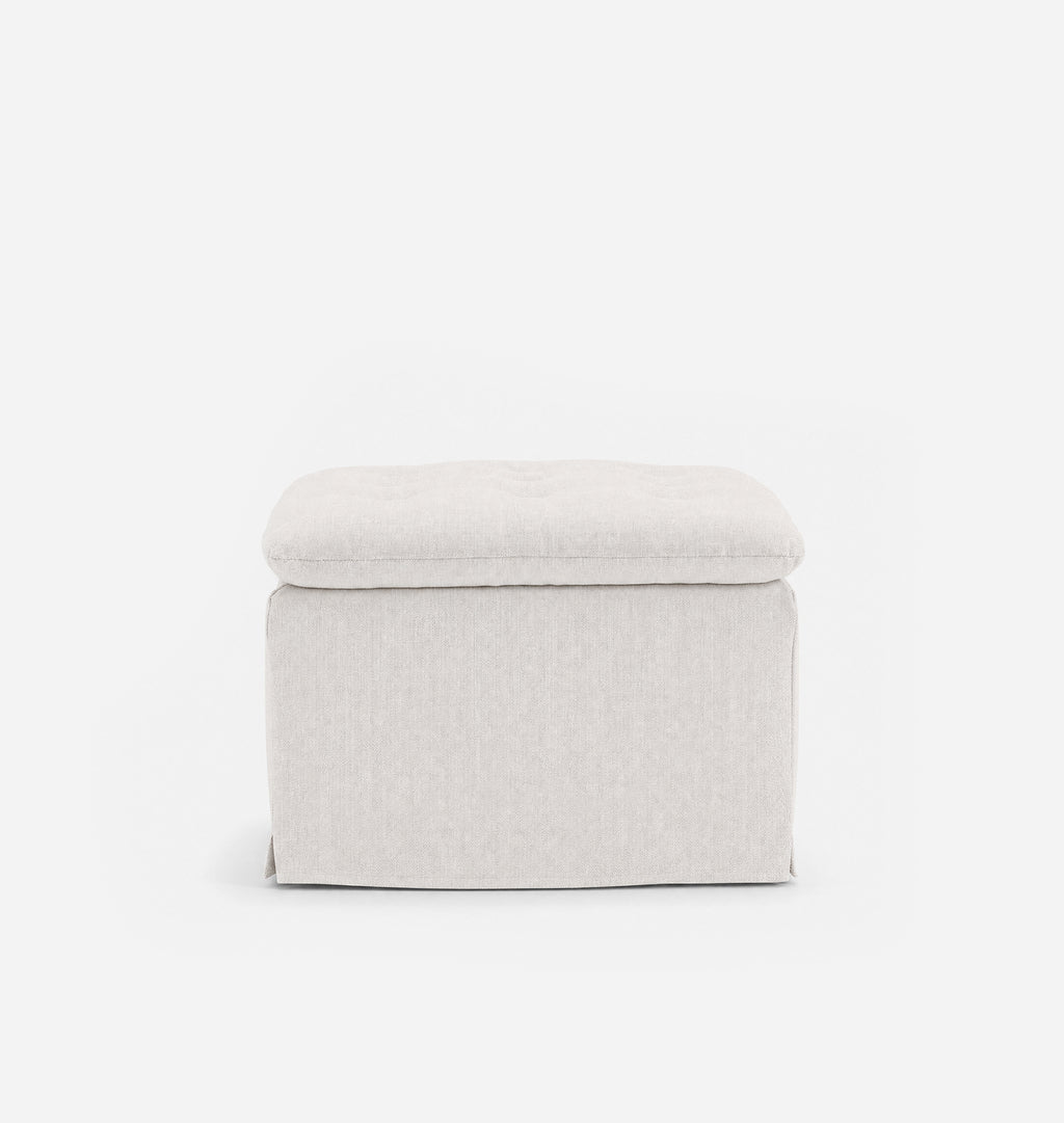 A square upholstered ottoman in a light beige textured fabric, shown from the front against a plain white background.