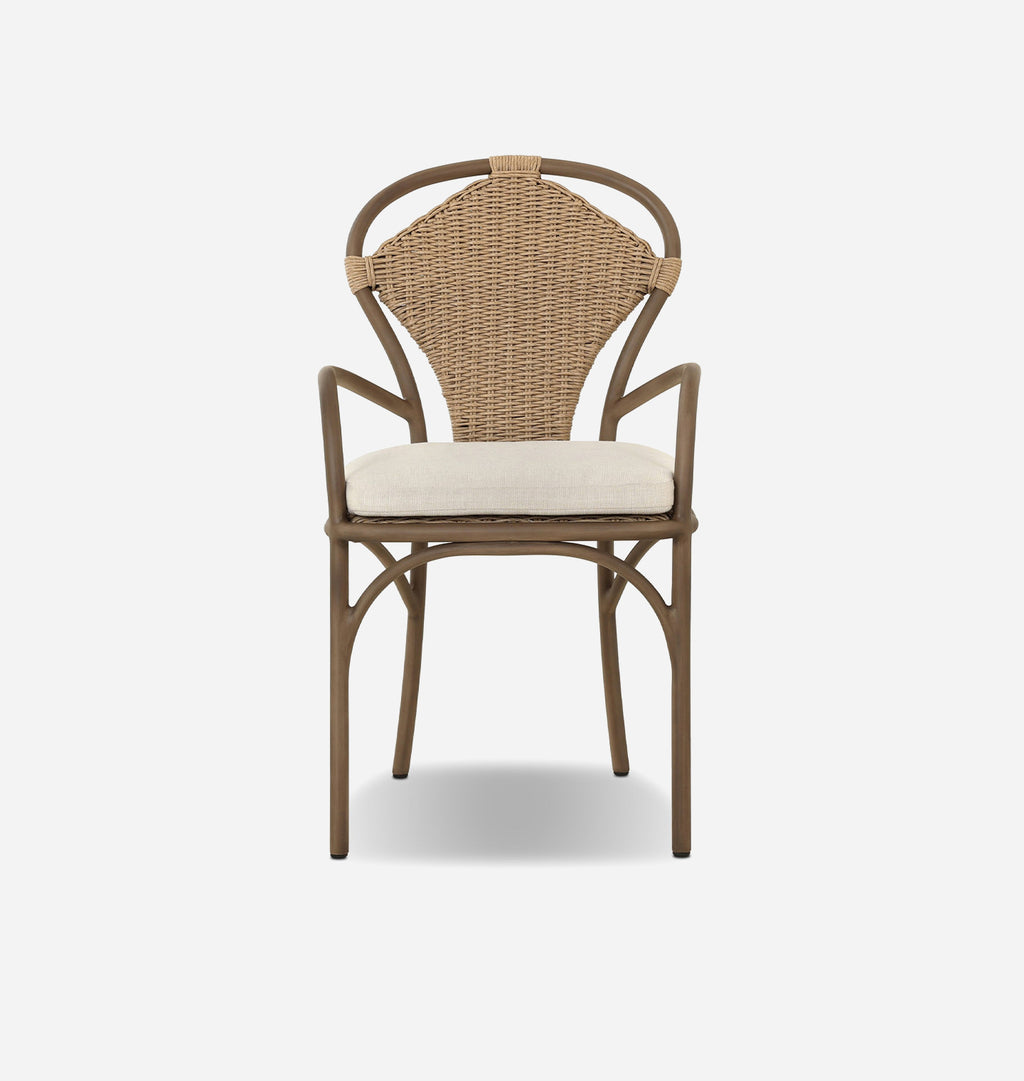 A classic French bistro dining chair with a curved brown metal frame, a woven natural wicker backrest, and a cream-colored seat cushion, shown against a plain light gray background.