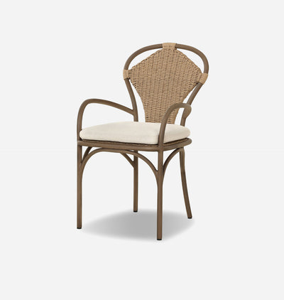 A modern bentwood dining chair with a natural woven rattan backrest, a light beige seat cushion, and a brown frame, shown against a plain light gray background.