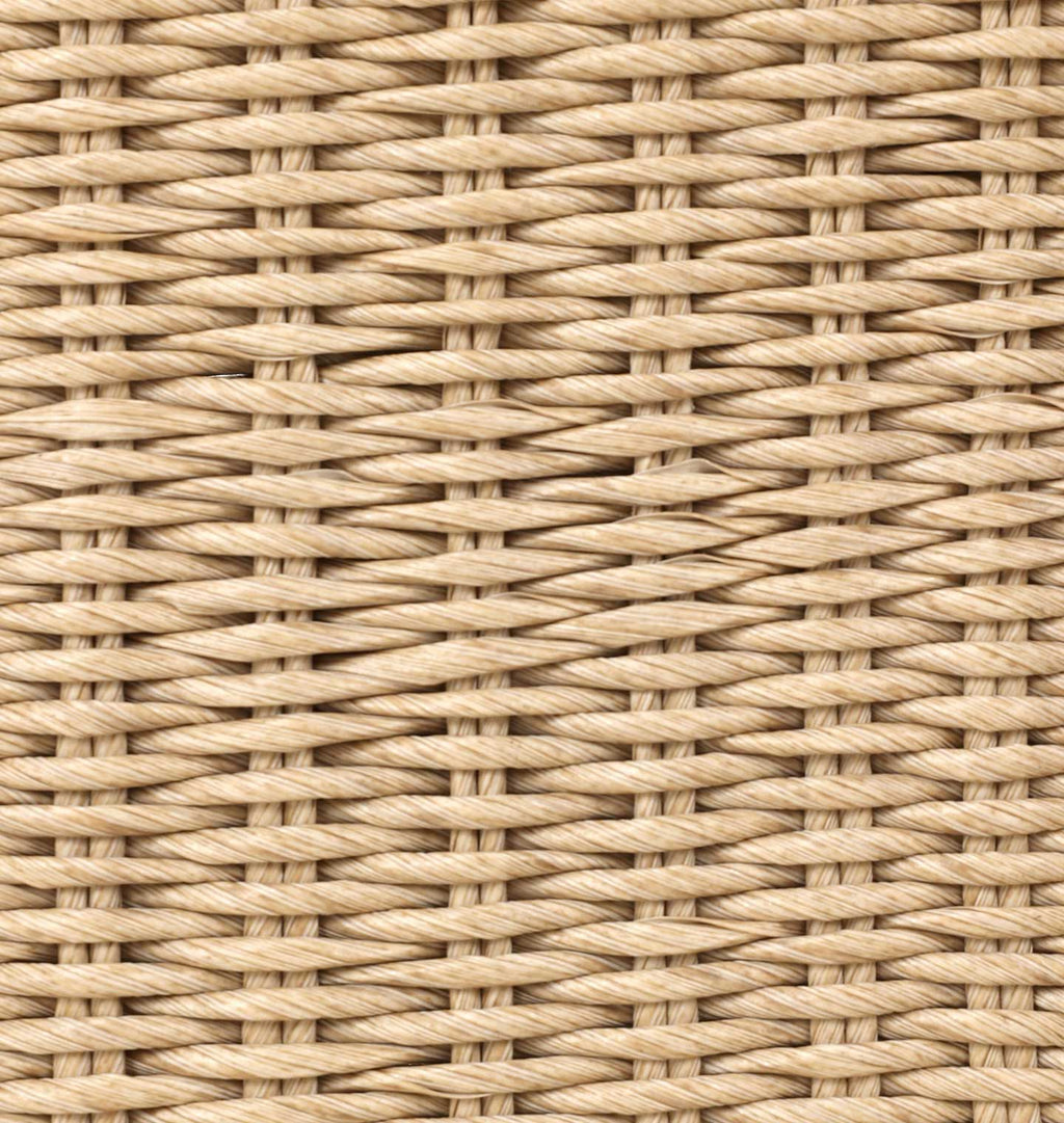 Close-up of a woven natural fiber texture, such as wicker, rattan, or seagrass, in a light tan color.