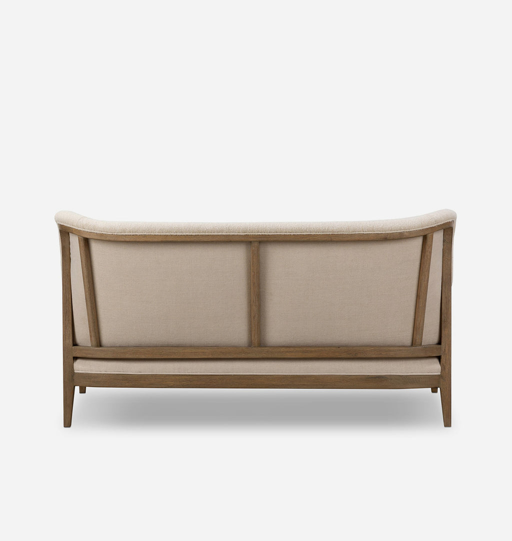 A modern wooden bench with a curved backrest and light beige upholstered panels, shown from the back against a plain white background.