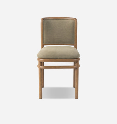 A modern dining chair with a light oak wood frame and textured sage green fabric upholstery on the seat and backrest, shown against a plain white background.