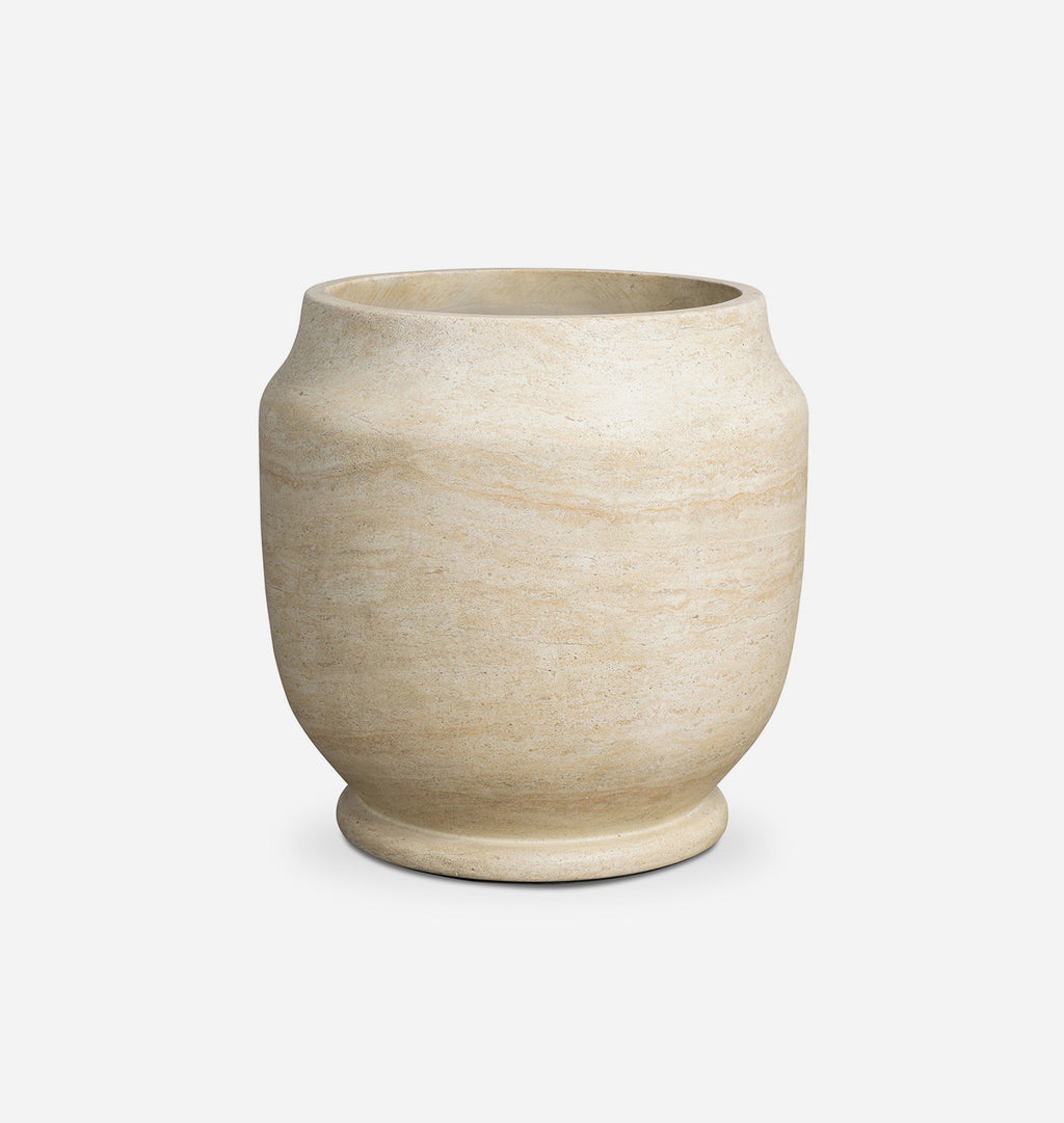 A small round planter pot made of natural beige stone with subtle horizontal texture, shown on a clean white background.