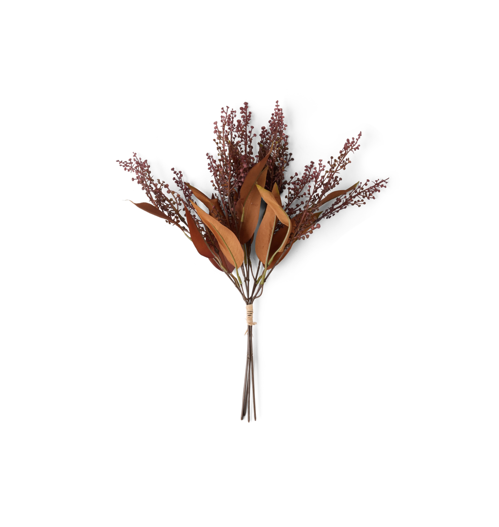 A faux floral arrangement featuring reddish-brown leaves and small berry-like clusters on a white background.