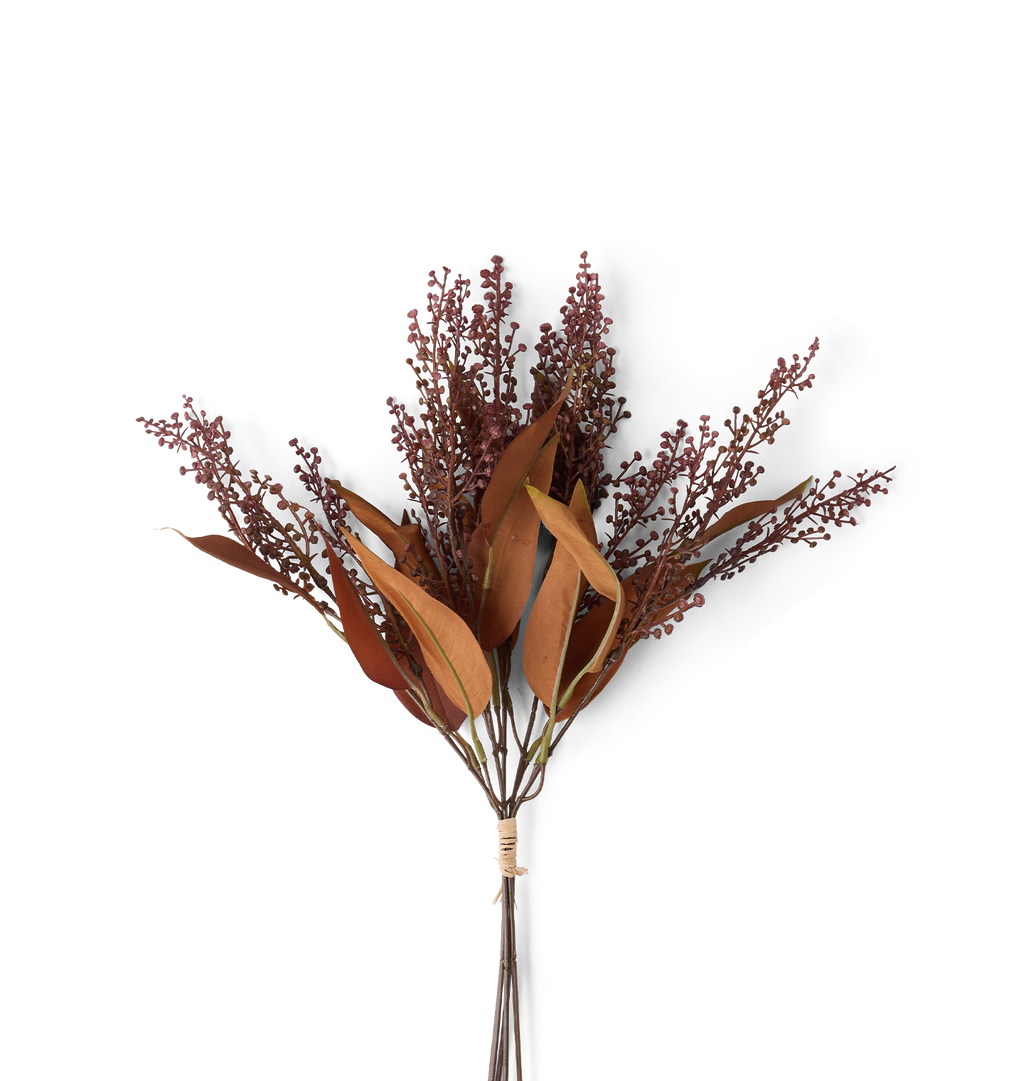 An artificial autumnal floral stem bundle featuring rust-brown leaves and clusters of small dark burgundy berries, tied with a simple paper band at the stem, set against a solid white background.