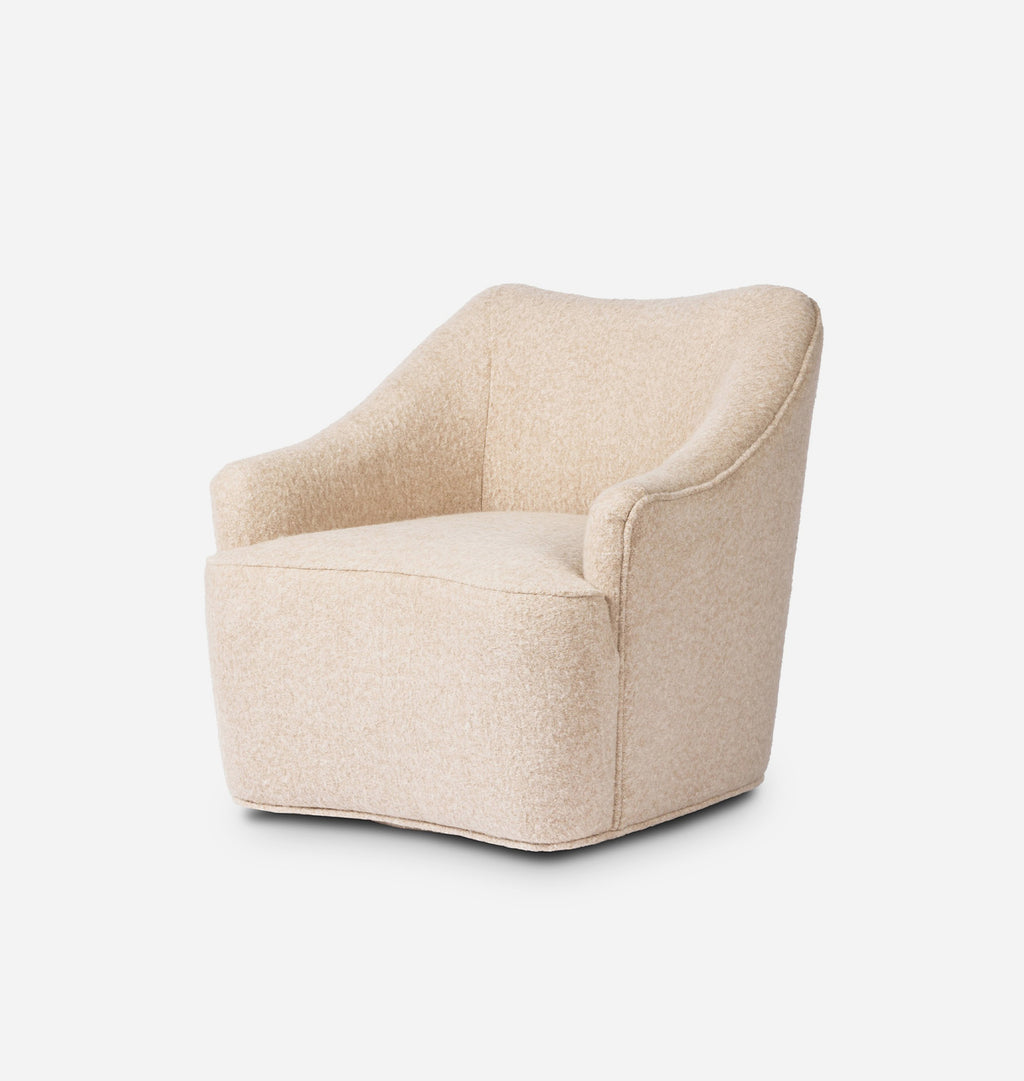 A modern barrel-style accent chair upholstered in a textured beige bouclé fabric, shown from a three-quarter angle against a clean white background.