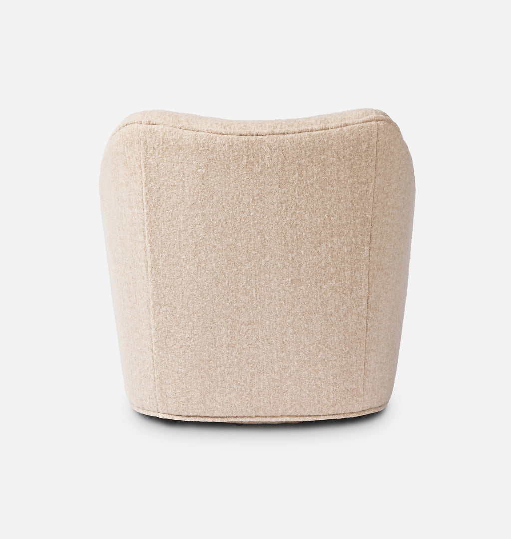A modern, low-profile barrel chair upholstered in a textured beige fabric, shown from the back against a clean white background.