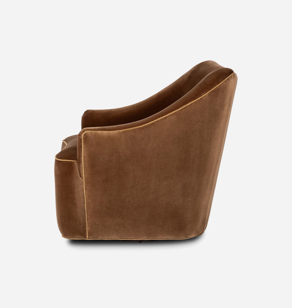 A modern low-profile armchair upholstered in rich brown velvet, shown from a three-quarters angle against a clean white background.