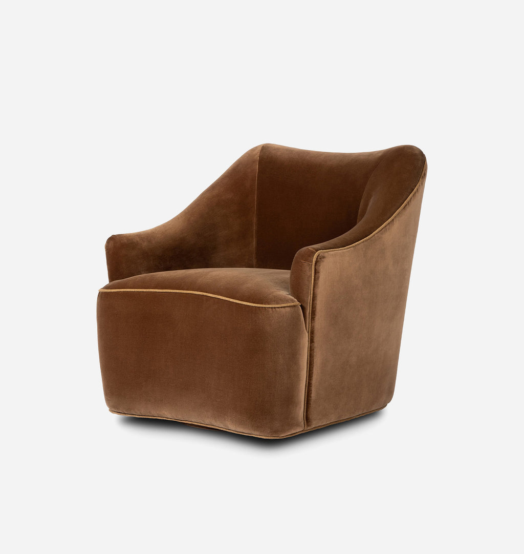 A modern barrel-style armchair upholstered in rich brown velvet, shown from a three-quarter angle against a clean white background.
