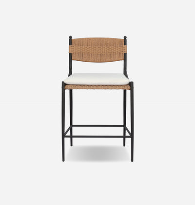 A modern counter stool with a black metal frame, a woven natural backrest and seat, and a white cushioned seat pad, shown against a light gray background.