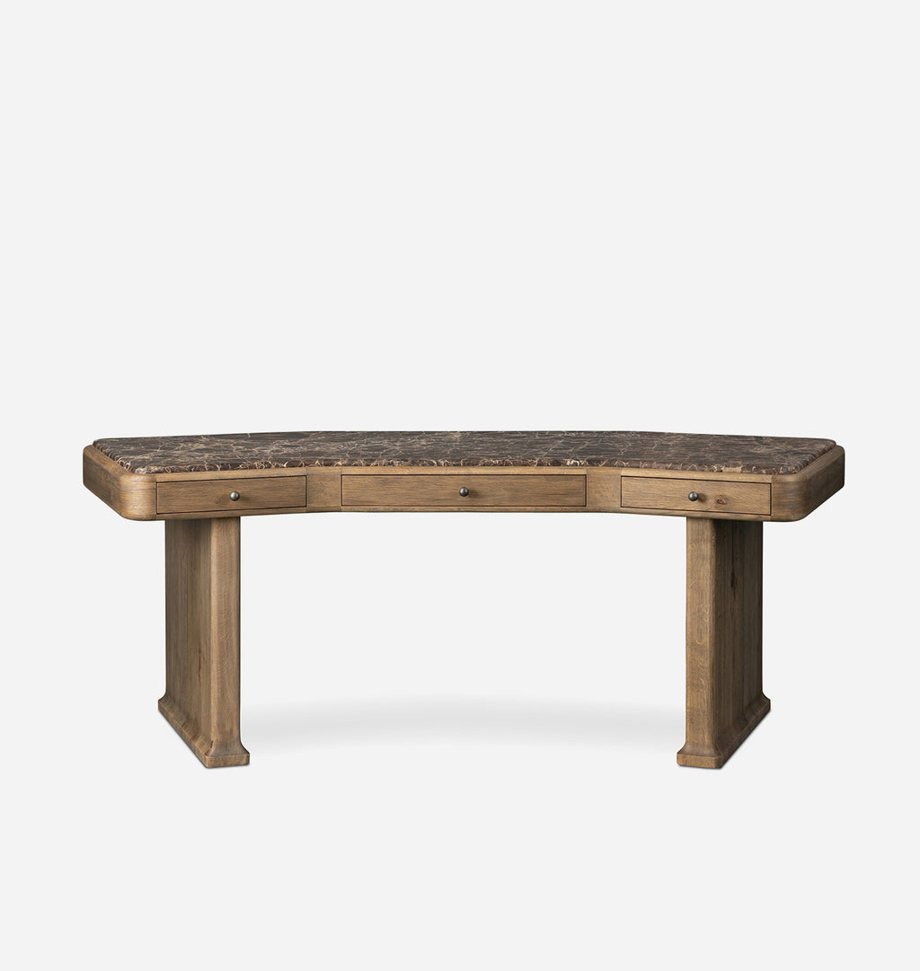 A rustic desk with a curved, dark brown marble top and a weathered brown wood frame, featuring three drawers on the front with small metal knobs, set against a plain light gray background.