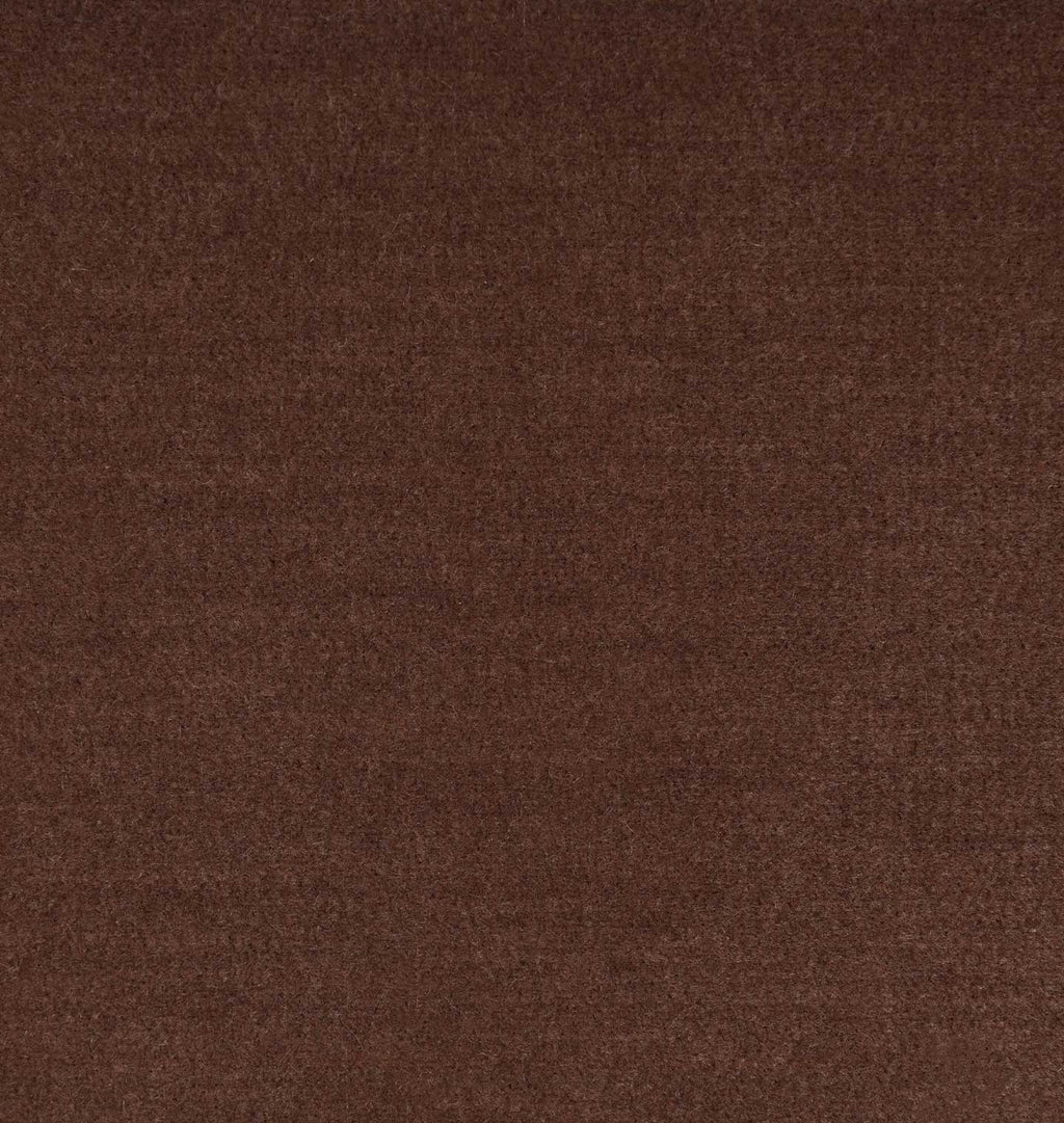 A close-up texture shot of a dark brown fabric or carpet material.