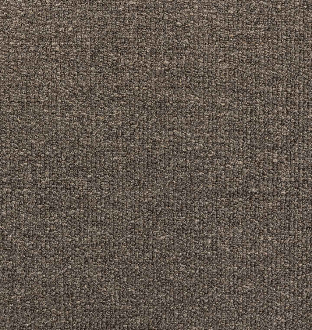 A close-up texture shot of a heathered brown and gray woven fabric, showing the detailed knit pattern.