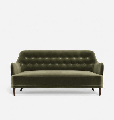 An olive green velvet loveseat sofa with a tufted backrest and dark wooden legs, shown against a plain white background.