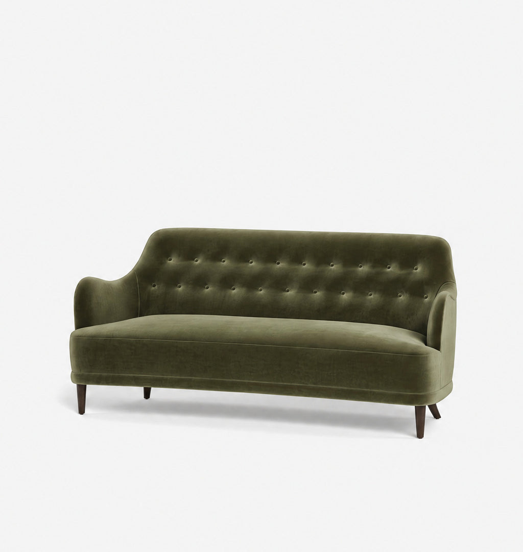 An olive green velvet loveseat sofa with a tufted backrest and dark wooden legs, shown against a plain white background.