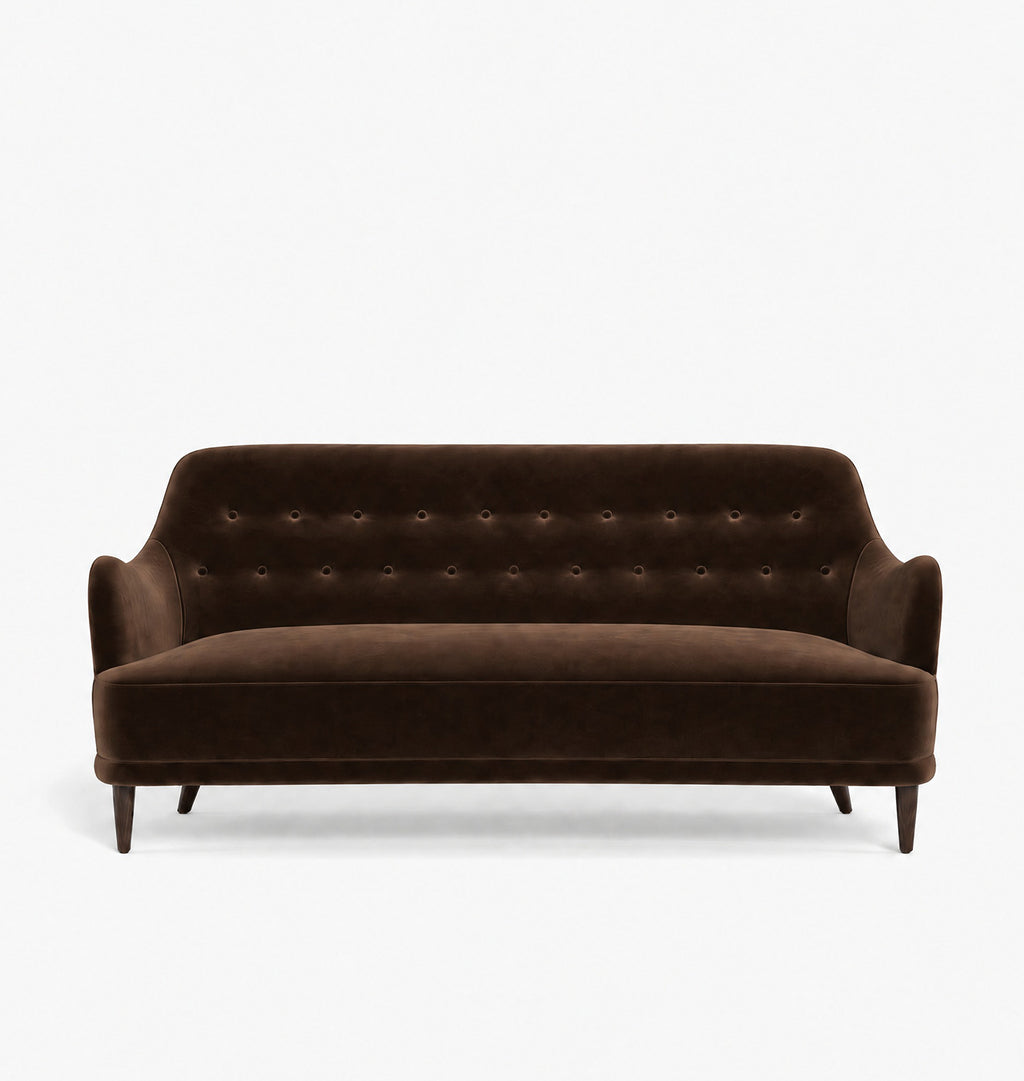 A dark brown velvet loveseat with button tufting on the backrest and tapered wooden legs, shown against a plain white background.