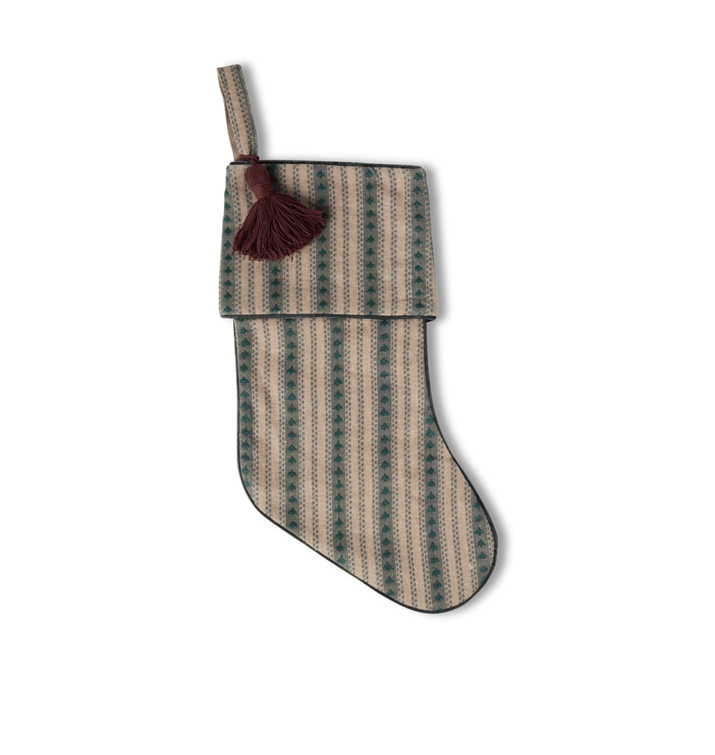 An embroidered striped stocking in a forest green color with a rust brown tassel shown on a white background 