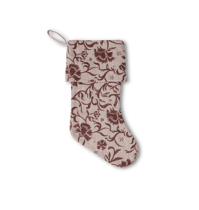An floral embroidred socking on a white background