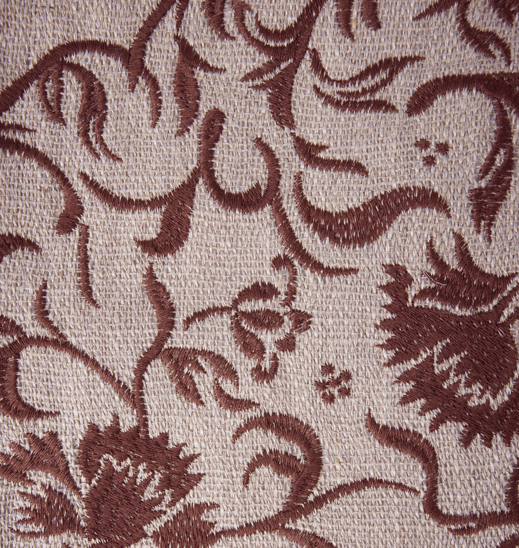 A close up detail shot of an embroidered pattern